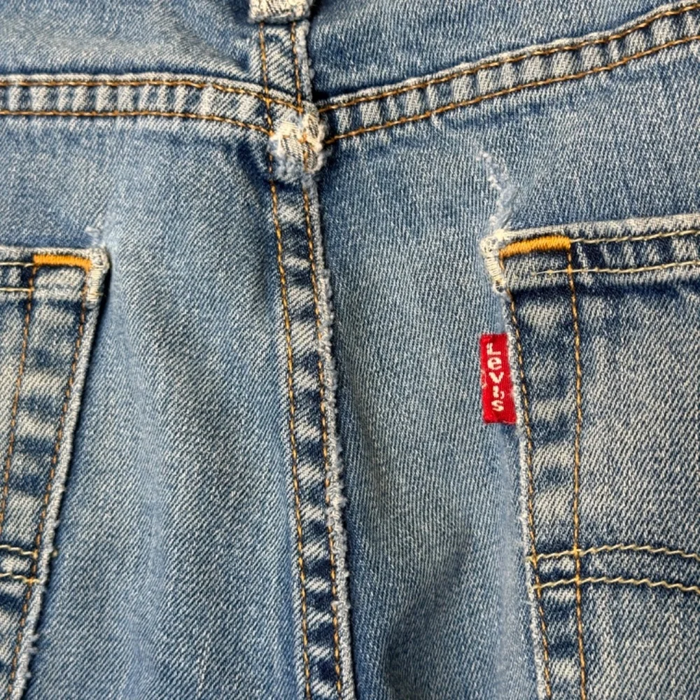 Levi’s 511 Perfect Medium Wash Thrashed Distressed High Rise Slim Tapered Jeans